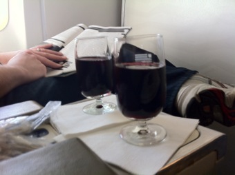 Sipping wine in first class