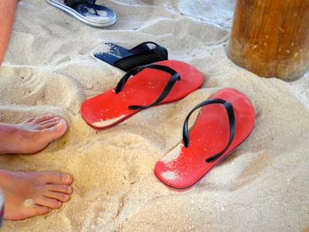 sandy flip-flops