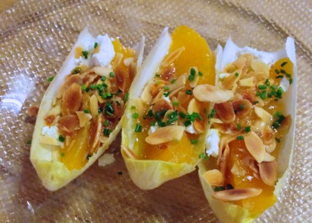 Endive with goat cheese, mandarin sections & almonds