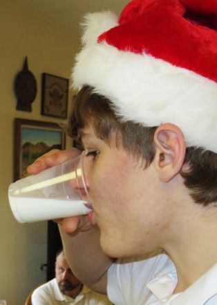 Santa drinking milk before delivering presents