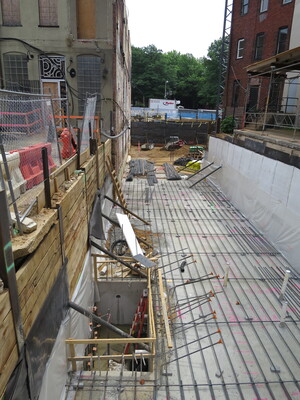 June 13. Pouring the base floor of the new building