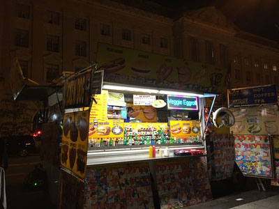 Brightly lit hot dog stand