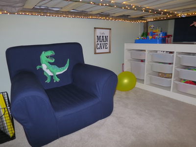 When Remy got bumped out of the nursery to make room for Everly, they made up a nice bedroom for him.  The Little Man Cave.