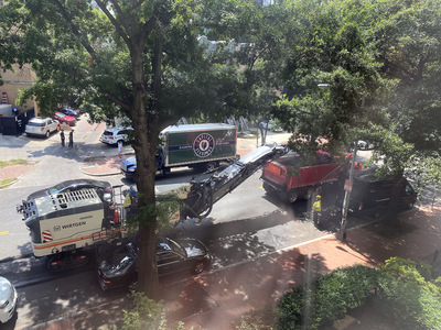 On Wed Aug 10, DC workers started to resurface Rhode Island Avenue NW in front of our building. They came VERY close to that Mercedes who ignored the temporary No Parking signs.