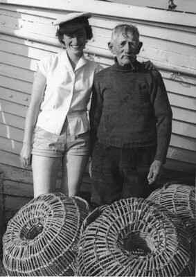 1960s? Me with fisherman. I have his cap on (filthy). What was I thinking?!