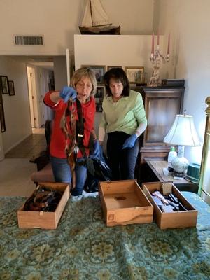 Karen and Pam help pack up the primary bedroom. Karen was shoked at the number of gun holsters and knives.