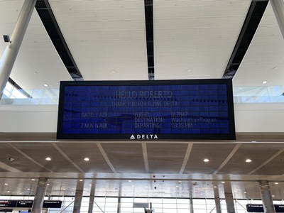 Personalized billboard, Delta's Parallel Reality virtual experience at Detroit Macnamara airport