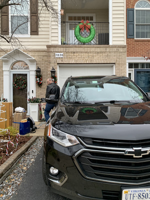 Unloading the car at the McMahon home