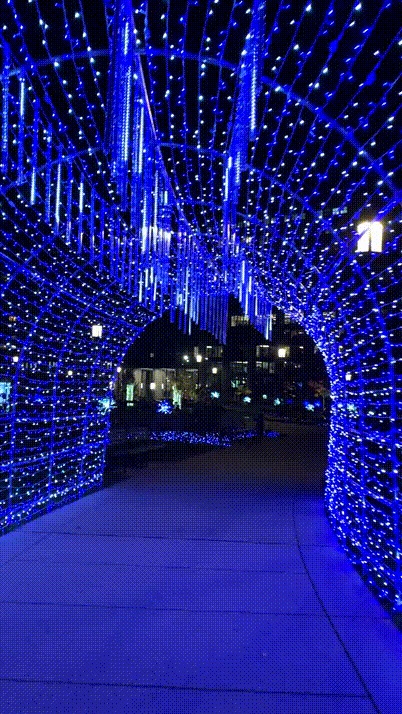 Tunnel of blue lights in motion