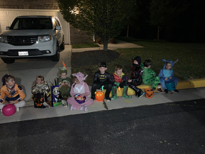 We finally caught up with Mason (Robin Hood). Bill and Rob traded our empty bag for Remy's full bag. "Who are you" Mason asked. Bill responded "We're here to steal candy." Mason and his friends did not forgive us for the rest of the night